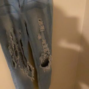 Distressed light washed jeans
